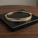Gouden slavenarmband met zirkonia