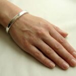 Christian 14 karaat wit gouden slavenarmband