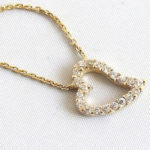 Gouden collier en hanger met zirkonia