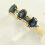 Gouden diamanten en saffieren ring