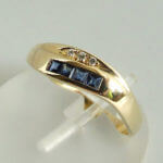 Gouden ring met saffier en diamant