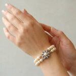 Parel armband met saffier en diamanten slot