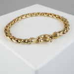 14 karaat geel gouden gevlochten armband