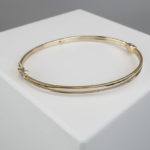 14 karaat gouden slavenarmband met veerslot