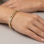 Christian gouden slavenarmband met zirkonia