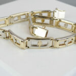 Christian gouden bicolor armband