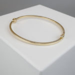 Geel gouden 14 karaat slavenarmband