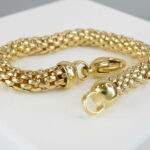 Geel gouden Christian schakelarmband