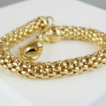 Geel gouden Christian schakelarmband
