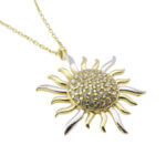 Gouden collier en zirkonia zonnehanger
