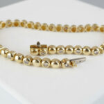 Geel gouden tennisarmband met diamanten