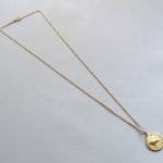 Gouden collier met stier hanger