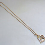 Gouden collier met zirkonia hanger
