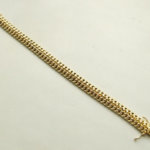 Gouden gevlochten armband