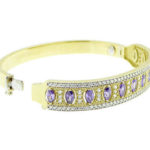 Gouden schakelarmband met amethyst en zirkonia