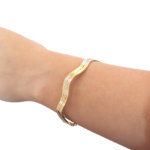 Gouden tricolor slavenarmband golvend model