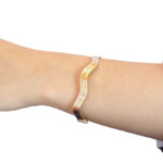 Gouden tricolor slavenarmband golvend model
