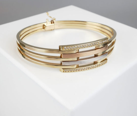 Gouden tricolor slavenarmband met zirkonia