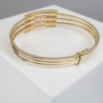 Gouden tricolor slavenarmband met zirkonia