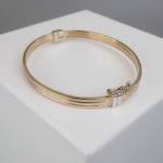 Gouden tricolor slavenarmband vlak model