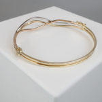 Tricolor gouden slavenarmband