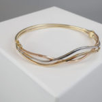 Tricolor gouden slavenarmband