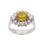 Wit gouden ring met saffier en briljant