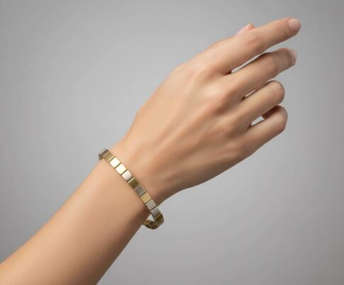 Gouden bicolor Christian schakelarmband