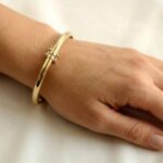 Christian 14 karaat gouden slavenarmband