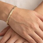 Gouden bicolor Christian schakelarmband