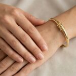 Christian 14 karaat gouden slavenarmband