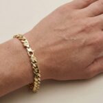 Christian geel gouden schakelarmband