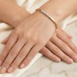 Geel gouden slavenarmband met briljanten