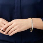 Geel gouden slavenarmband met briljanten