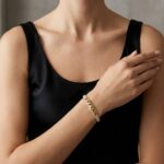 Christian gouden slavenarmband met zirkonia