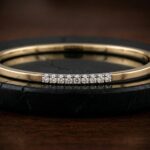 Geel gouden slavenarmband met briljanten