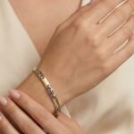 Gouden bicolor schakelarmband