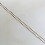 Gouden balletjes collier