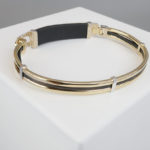 Gouden slavenarmband met leer