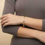 Christian bicolor gouden schakelarmband