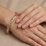 Gouden Christian bicolor schakelarmband