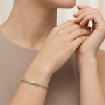 Gouden Christian bicolor schakelarmband