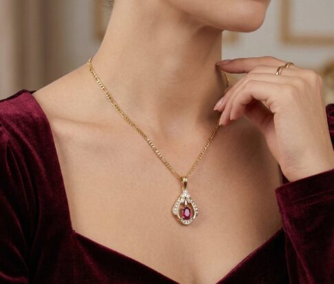 14 karaat gouden ketting en robijn hanger