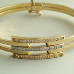 Gouden Christian slavenarmband met zirkonia