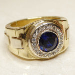 Gouden ring met diamanten en saffier