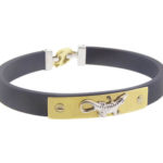 Rubberen en gouden armband met alligator