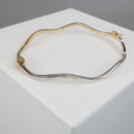 14 karaat gouden bicolor slavenarmband Christian