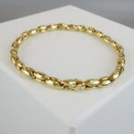 Gouden schakelarmband