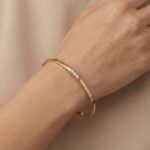 Gouden slavenarmband met diamanten