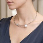 Wit gouden spang met diamant en parel